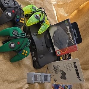 Nintendo 64 Console with Black and Neon Green Controllers